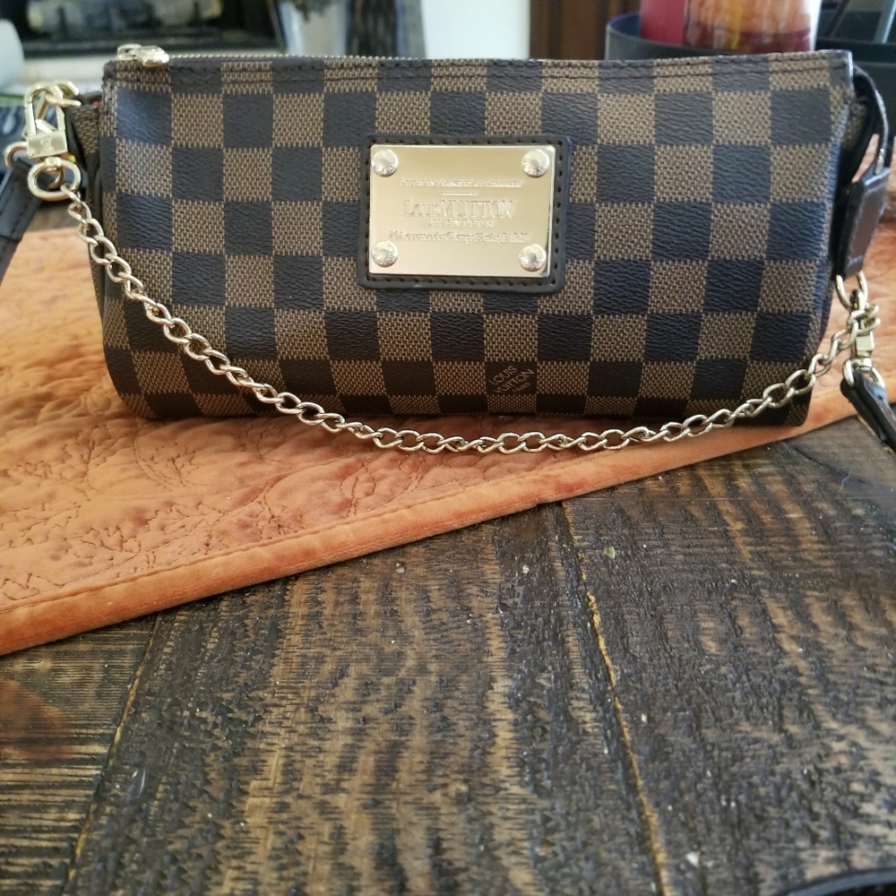 Louis Vuitton cross body leather purse